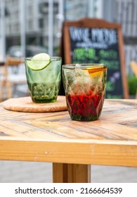 Two Drinks On The Table At The Coffee Shop In The Summer Time. Drinks With Lime. Fresh Drinks On The Table, Refreshing.