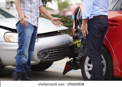 Two Drivers Arguing After Traffic Accident - Shutterstock ID 290605838