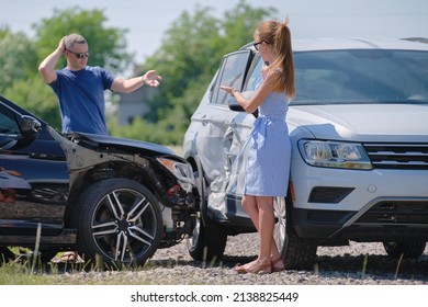 Two drivers having argument over who is guilty in car crash accident. Road safety and insurance concept - Shutterstock ID 2138825449