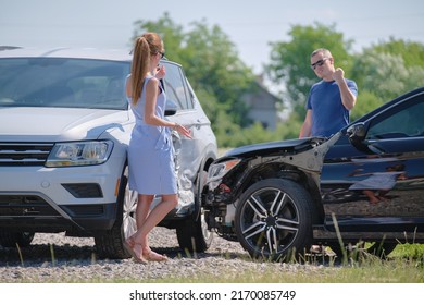 Two drivers having argument over who is guilty in car crash accident. Road safety and insurance concept - Shutterstock ID 2170085749