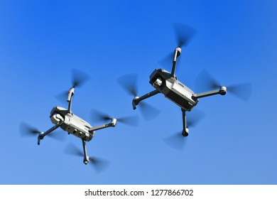 Two drones in flight