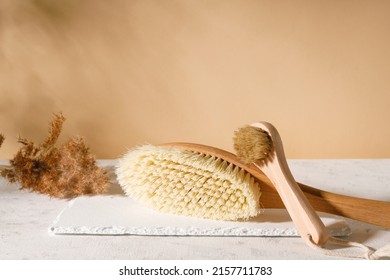 Two Dry Body Brushes On A Beige Background. Set Of Home SPA Cosmetic Products. Women's Organic Skin Care. Prevent Cellulite And Body Problem At Home. Copy Space