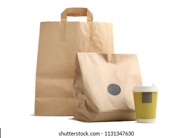 Two Eco Package And A Glass Of Coffee Isolated On White Background. Concept Packaging Of Meals.