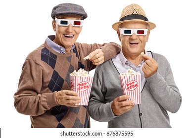 Two elderly men wearing 3D glasses and having popcorn isolated on white background