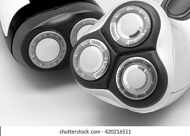 Two electric shaver with circular closecut blades.