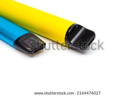 Two electronic cigarettes disposable and refillable with a replaceable cartridge in a blue and yellow body, photographed against a white background
