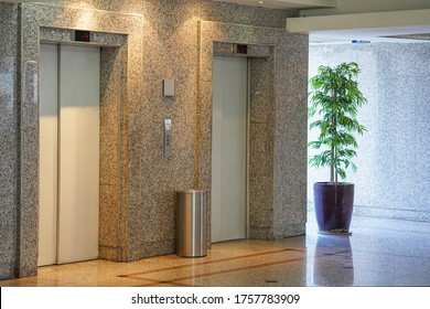 Two Elevator Doors In Office Building. Wide Angle View Of Modern Elevators With Doors. Elevators In The Modern Lobby House Or Hotel.