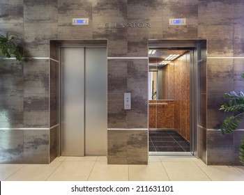 Two elevators in hotel lobby