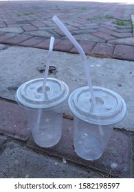two empty bottle in the field