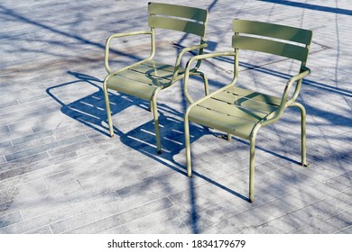 Two Empty Chairs At The Bellevue Square At Zurich, Switzerland.