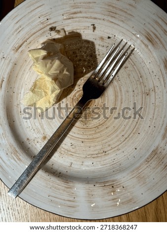 Two Empty Plates With Fork Napkin, Overhead View, Glass And Cutlery, Rustic Wood Tabletop, Mild Crumbs, Intimate Setting Suggesting Companionship, Soft Ambient Glow, Lingering Conversation