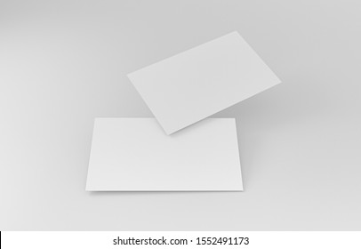 Two Empty White Business Cards. Mockup For Branding Identity. Blank Name Card Or Poster On White Background, Studio Shot. Great For Text & Logo For Design Creative Concept. 3D Illustration