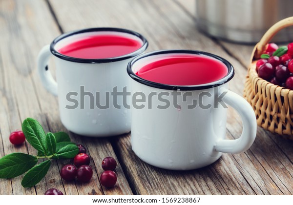 Two Enameled Mugs Cranberry Juice Morsel Stock Photo Edit Now 1569238867