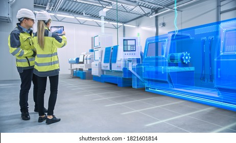 Two Engineers Use Digital Tablet Computer with Augmented Reality Software to Create 3D CNC Machinery, Equipment Visualization in Factory. Industry 4.0 Facility. Augmented Reality Graphics VFX Effects