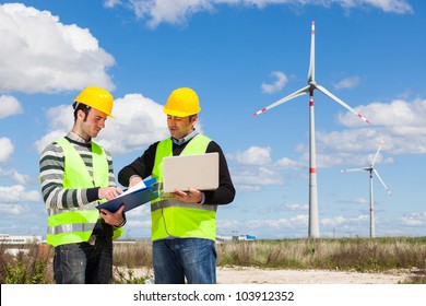 Two Engineers In A Wind Turbine Power Station