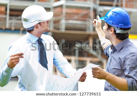 Two engineers working in a construction site Foto d'archivio © 