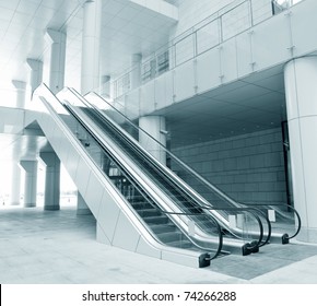 Two Escalators In New Modern Building.