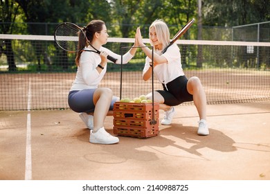 Two European Athlete Women At Tennis Playground