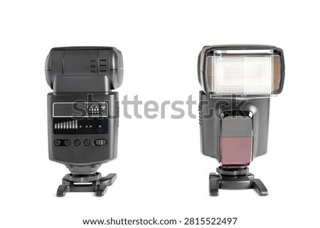 Two external camera speedlight flash units shown from the back and front views, isolated on a white background. Professional photography lighting equipment setup.