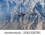 Two F-35C Lightning IIs, stationed at Naval Air Station Lemoore, fly in formation for an exercise Date 16.11.2018