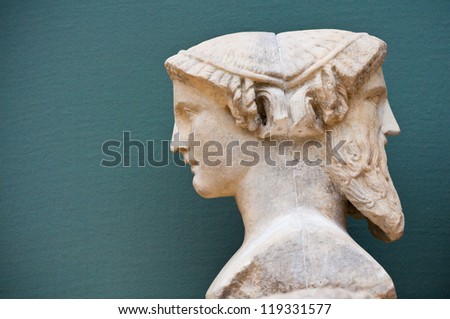 two faces of a person - historical sculpture
