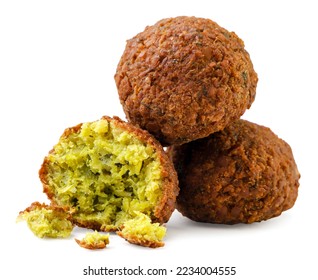 Two falafels and a broken half close-up on a white background. Isolated