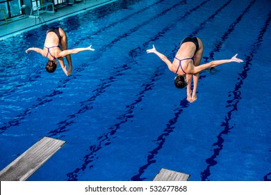 Two female divers on training or on competition. 