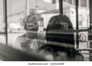 Two Female Friends Drinking Coffee And Enjoying Time In The Cafe At Railway Station