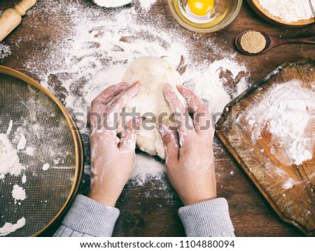 Similar – Foto Bild Frau beim Kneten von handwerklichem Brot auf Holztisch