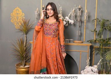 Two female models wearing traditional pakistaniindian shalwar kameez ethnic wear. Intricate embroidered chiffon and oraganza attire for events and party  wear.
Karachi, Sindh, Pakistan 24 March 2022