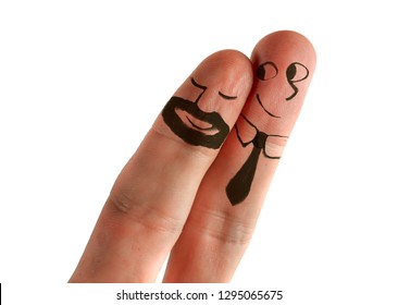 Two Fingers With Cartoon Man Face Painted As Happy And Free Homosexual Couple In Love Celebrating Valentines Day Or Getting Married In Gay Rights  Freedom And Respect Concept