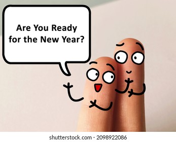 Two Fingers Are Decorated As One Person. He Is Asking Another If He Is Ready For The New Year.