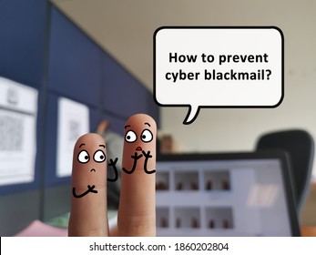 Two Fingers Are Decorated As Two Person. One Of Them Is Asking Another One How To Stop Cyber Blackmail.