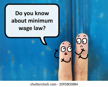 Two Fingers Are Decorated As Two Person. They Are Discussing About Salary And Wage. One Of Them Is Asking Another If He Knows About Minimum Wage Law.