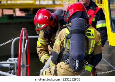 two firefighters during exercise on the water