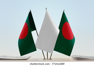 Two Flags Of Bangladesh With A White Flag In The Middle