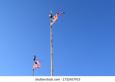 Two flags blowing in the wind