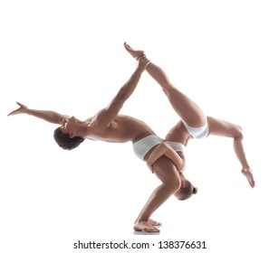 Two Flexible Acrobats Posing In Studio