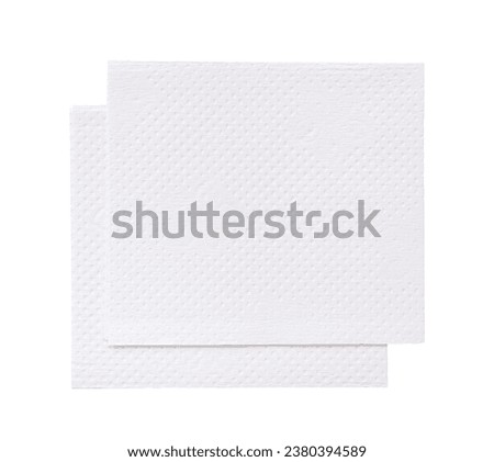 Two folded pieces of white tissue paper or napkin in stack tidily prepared for use in toilet or restroom are isolated on white background. Top view