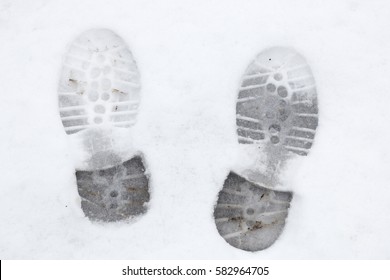 Two Foot Prints In Snow, Man's Shoes