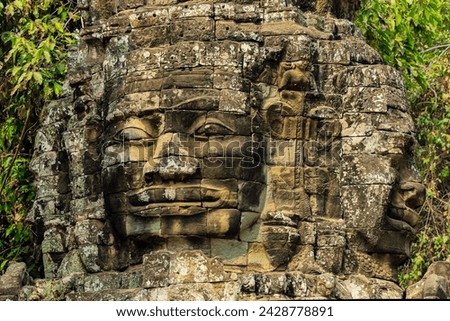 Two of four carved faces on gopura entrance way to the 12th century banteay kdei temple in ancient angkor, angkor, unesco world heritage site, siem reap, cambodia, indochina, southeast asia, asia