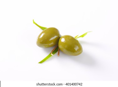 Two Fresh Green Olives On White Background