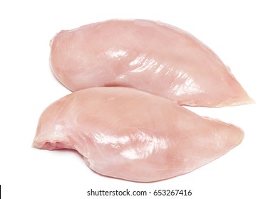 Two fresh raw chicken breasts on white background.
