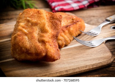 Two Fried Cod Fillet Pieces. 