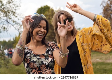 Two Friends Dancing At Music Festival In Summer 