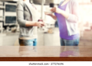 Two Friends Drinking Coffee And Brown Desk 