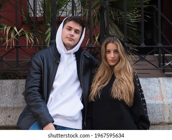 Two Friends Hanging Out In The Street