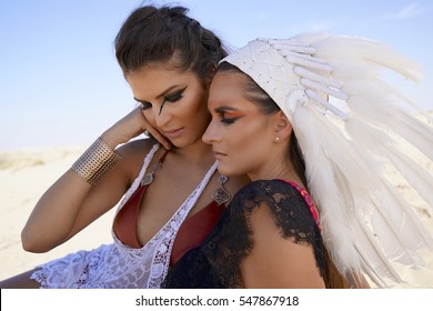 Two Friends Having A Moment In Burning Man Desert Warrior Outfits