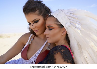 Two Friends Having A Moment In Burning Man Desert Warrior Outfits