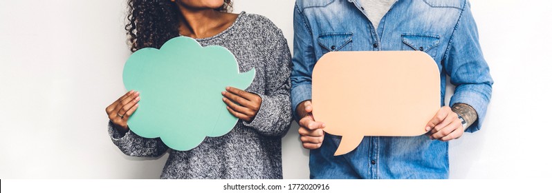 Two Friends Holding A Speech Bubble Icon Together